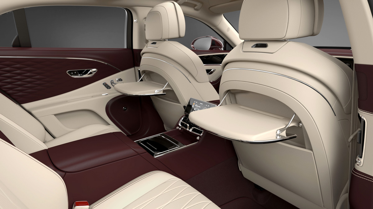The main thing from now on, Flying Spur can be ordered with a four-seat cabin. In this case, separate seats with a full set of individual adjustments are installed in the back row, and between them is a massive console with two Cup holders, a box for small things, two USB connectors and an optional wireless charger for smartphones.